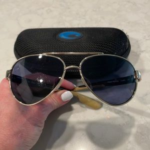 Costa Del Mar Loreto LR64 with 580 polarized glass lens. Used good condition